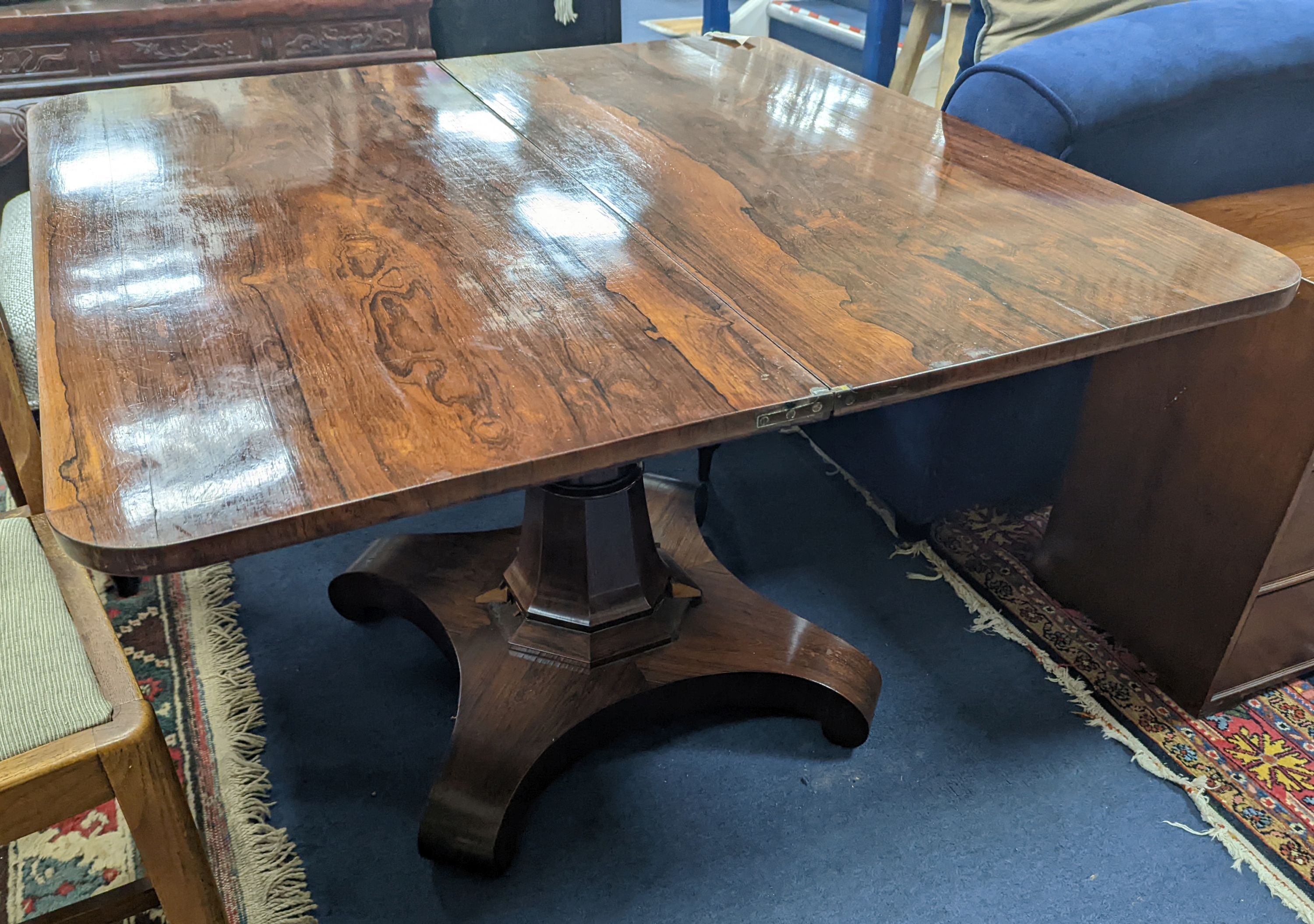 An early Victorian Scottish rosewood rectangular folding tea table, width 106cm, depth 52cm, height 74cm